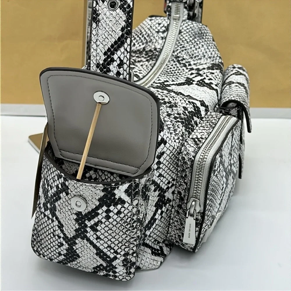 MICHAEL KORS Dakota Md Snake Embossed Leather Pocket Shoulder Bag
ALUMINUM
NWT - Picture 5 of 16